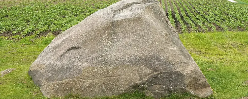 Large Devil’s Stone boulder near Švendubrė village and Raigardas Valley