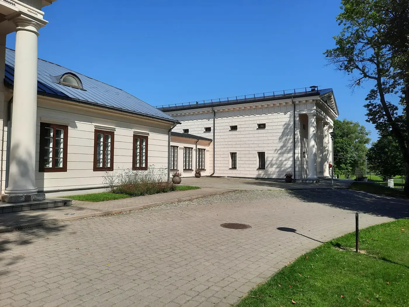 Restored classical façade of Leipalingis Manor in Lithuania